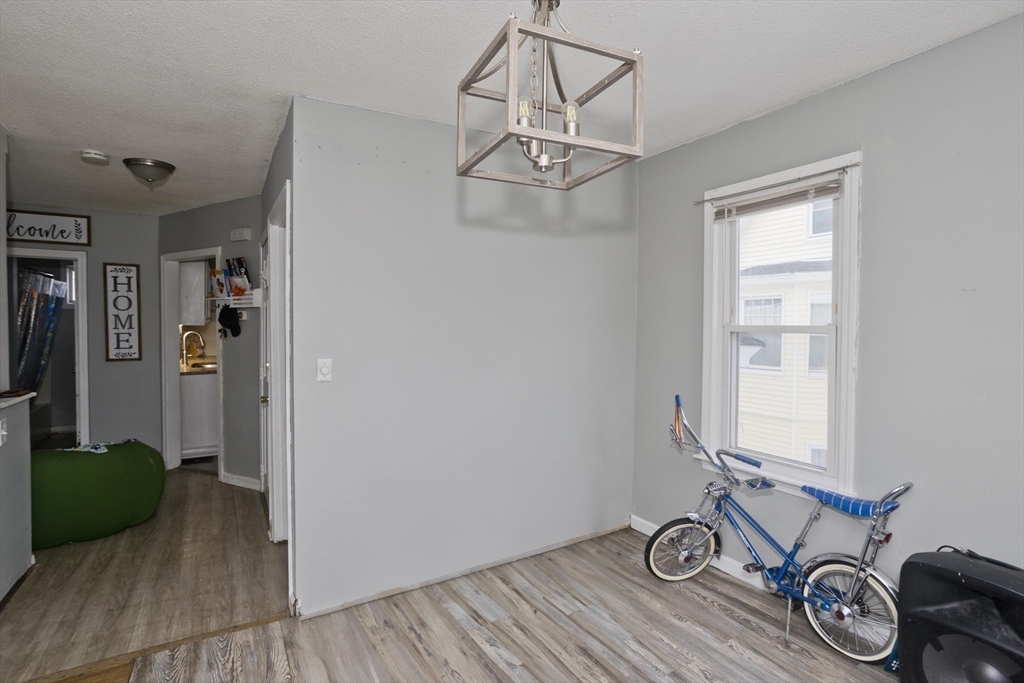 52 Orlando Street Springfield, MA 01108 - Photo 3 of 29 a view of a room with gym equipment