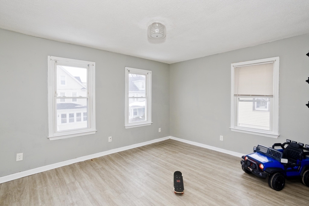 52 Orlando Street Springfield, MA 01108 - Photo 4 of 29 a view of a livingroom with a window