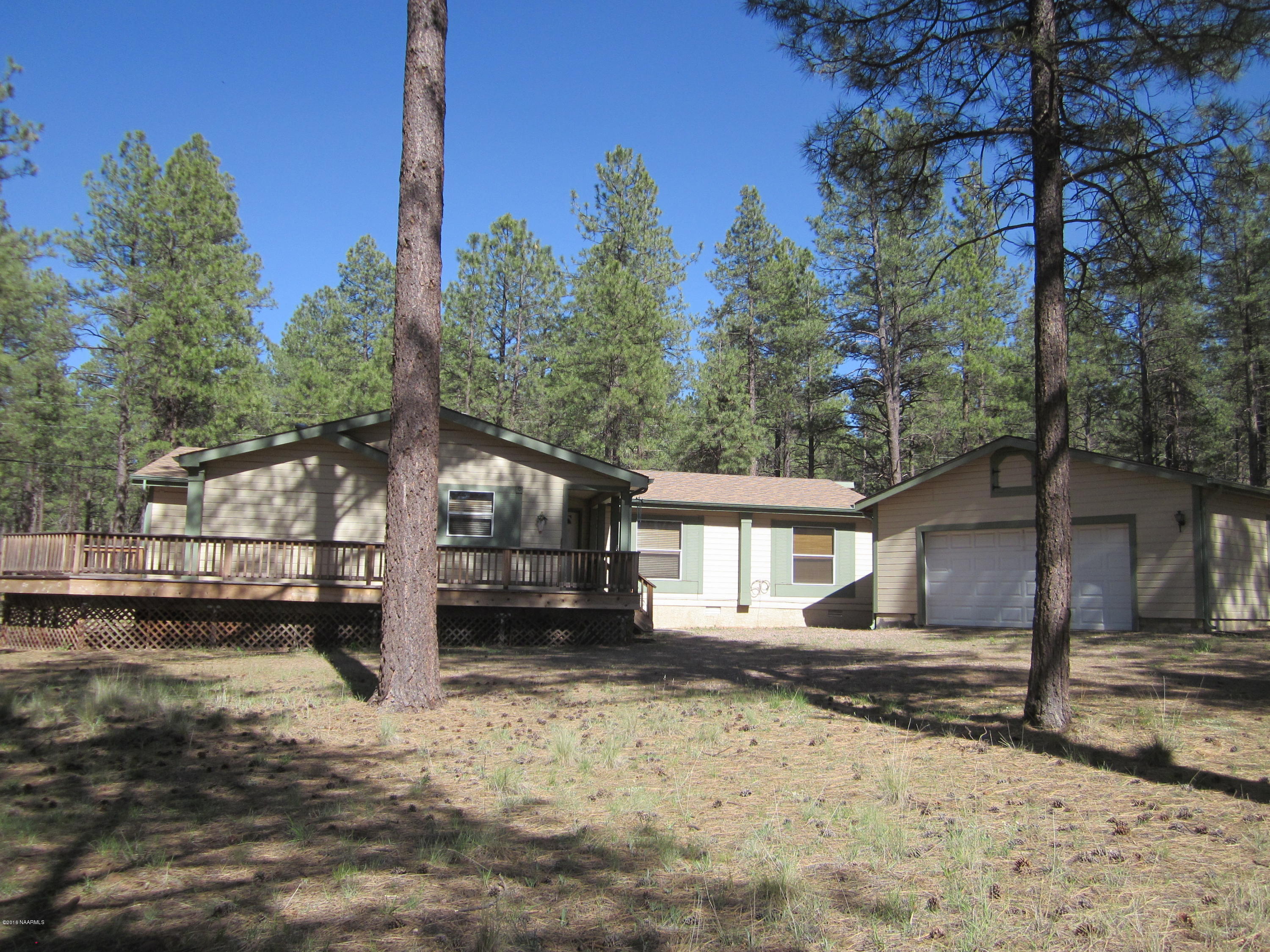 6916 North Spring Valley Road Parks, AZ 86018 - Photo 1 of 29 Front View