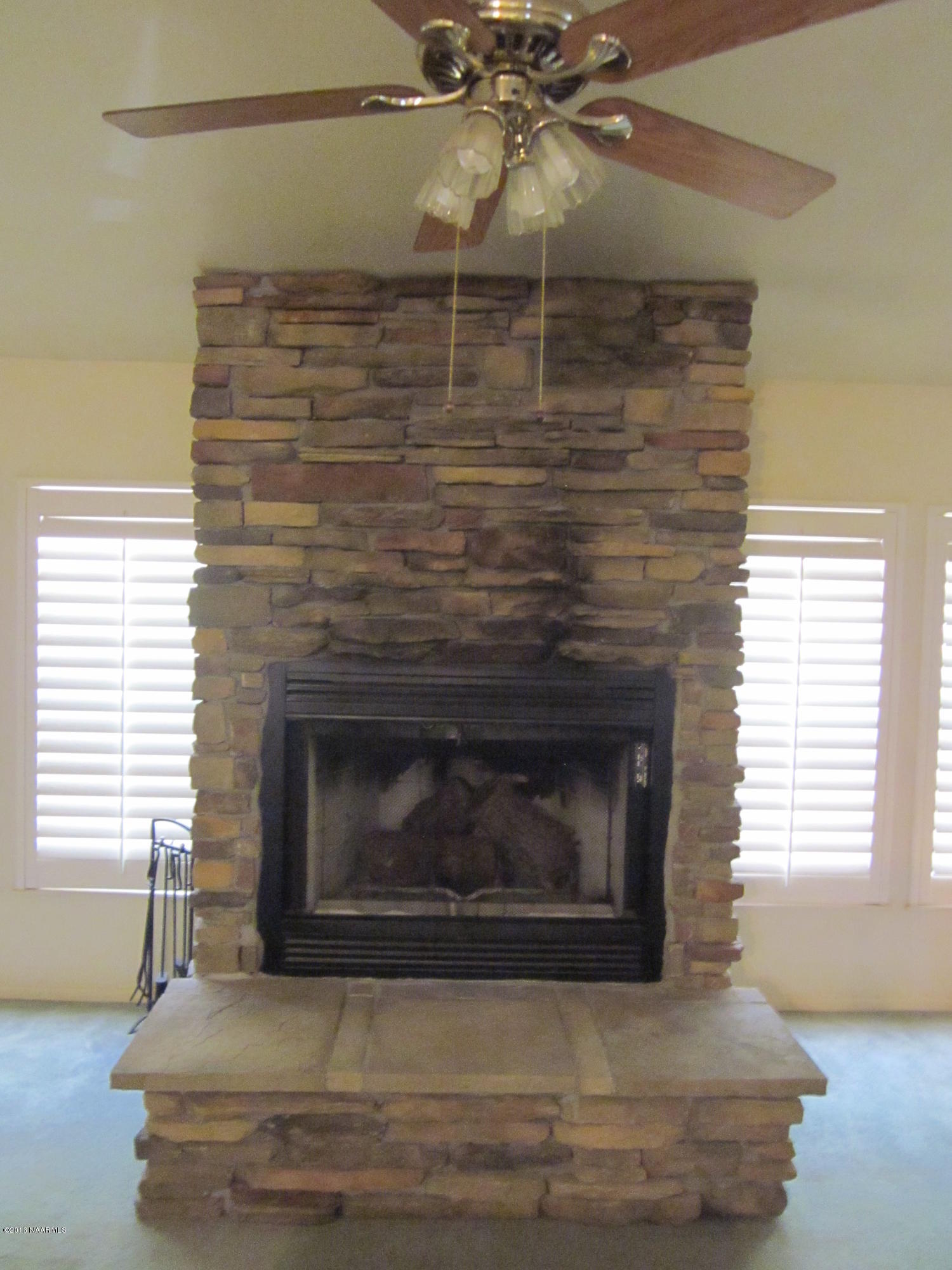 6916 North Spring Valley Road Parks, AZ 86018 - Photo 13 of 29 fireplace