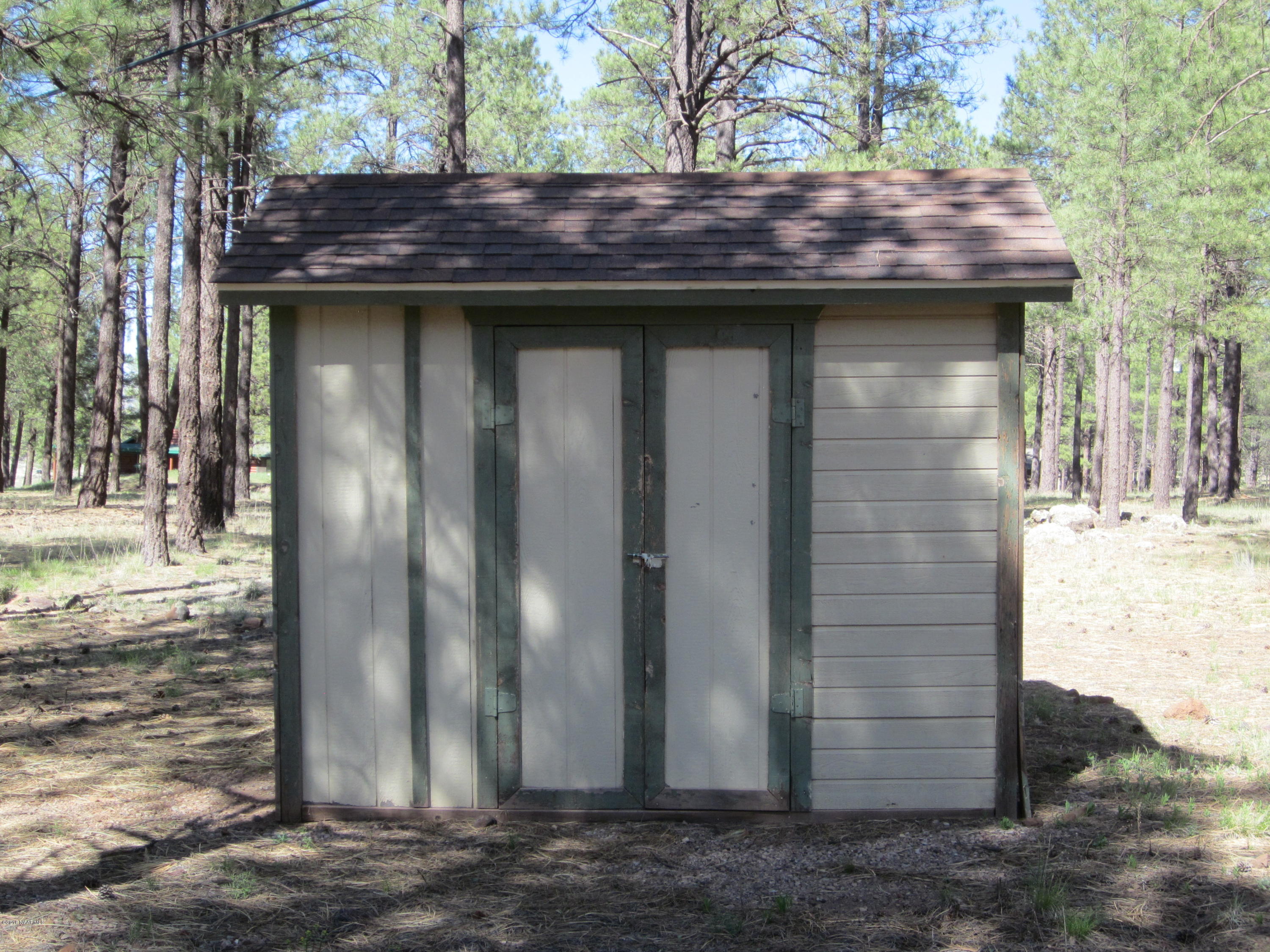 6916 North Spring Valley Road Parks, AZ 86018 - Photo 25 of 29 storageshed