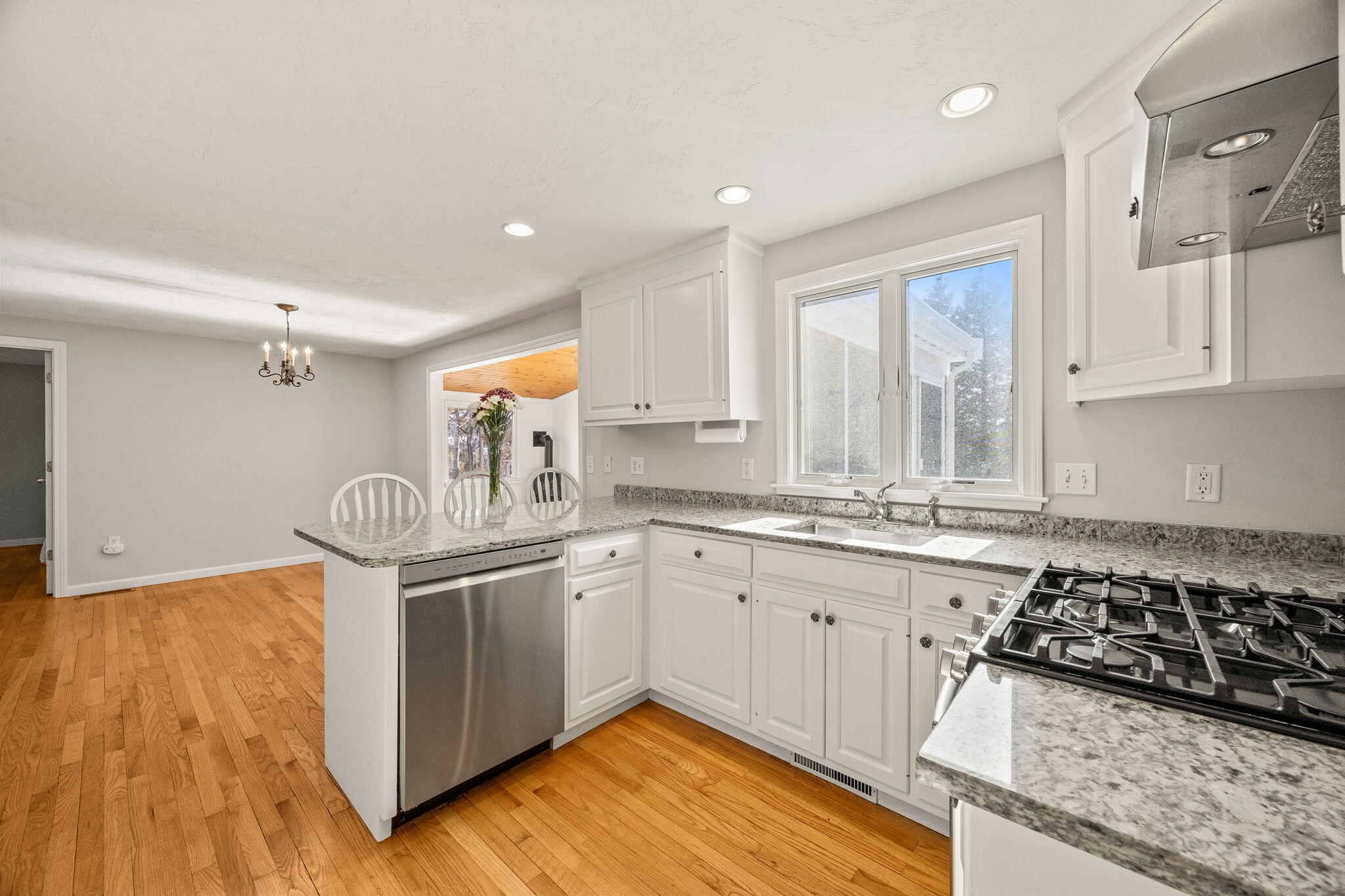 84 Middle Road South Chatham, MA 02659 - Photo 11 of 48 a kitchen with stainless steel appliances granite countertop a stove a sink and a microwave