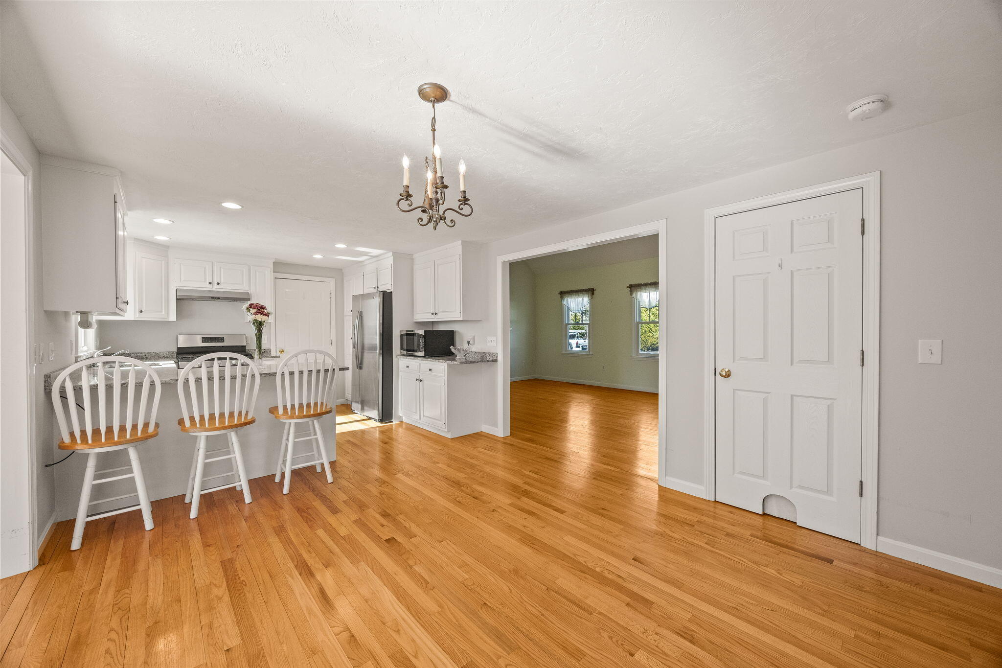 84 Middle Road South Chatham, MA 02659 - Photo 14 of 48 a view of a dining room with furniture and wooden floor