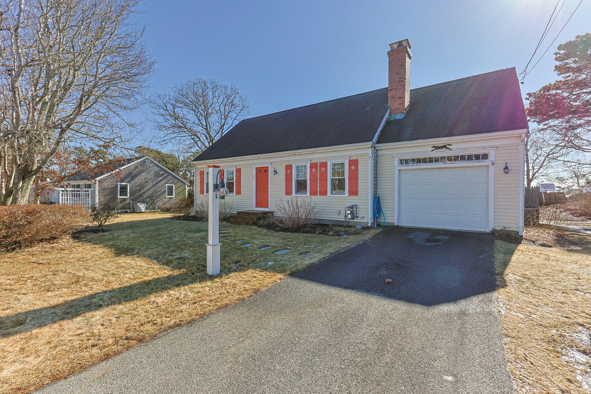84 Middle Road South Chatham, MA 02659 - Photo 47 of 48 a front view of a house with garden