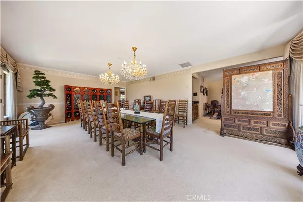a kitchen with stainless steel appliances granite countertop a stove and a refrigerator