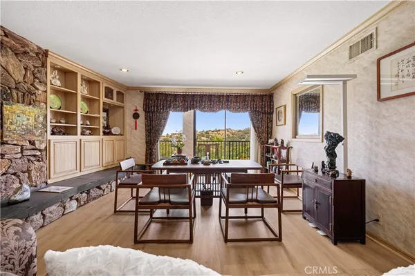 a view of a livingroom with furniture and a rug
