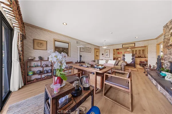 a bathroom with a sink mirror and next to a window