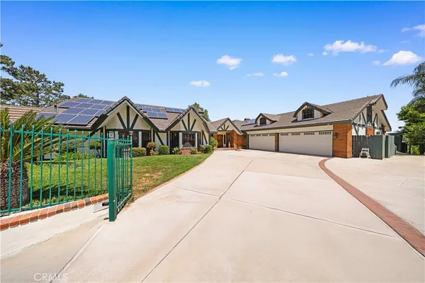 a view of a house with a swimming pool