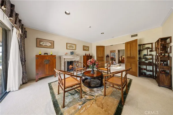 a living room with furniture and a table