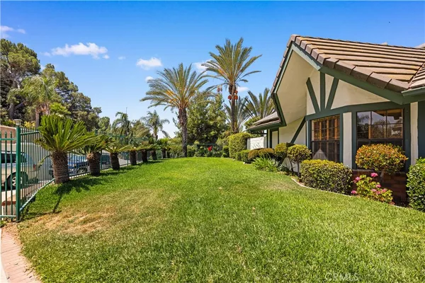 an aerial view of a house with a swimming pool