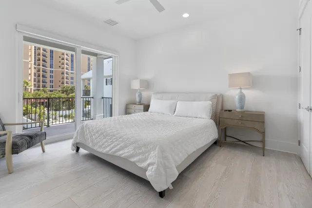 a bathroom with a sink shower and a mirror