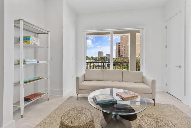 a bathroom with a toilet and a shower curtain