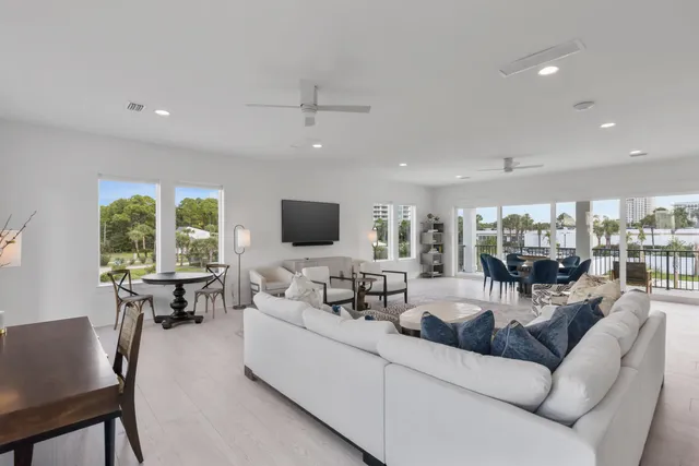 a large kitchen with stainless steel appliances granite countertop a lot of counter space and a sink