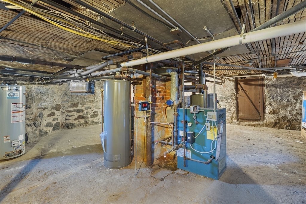 15-17 Cushman Road Boston, MA 02135 - Photo 23 of 27 a view of a storage room with shelves