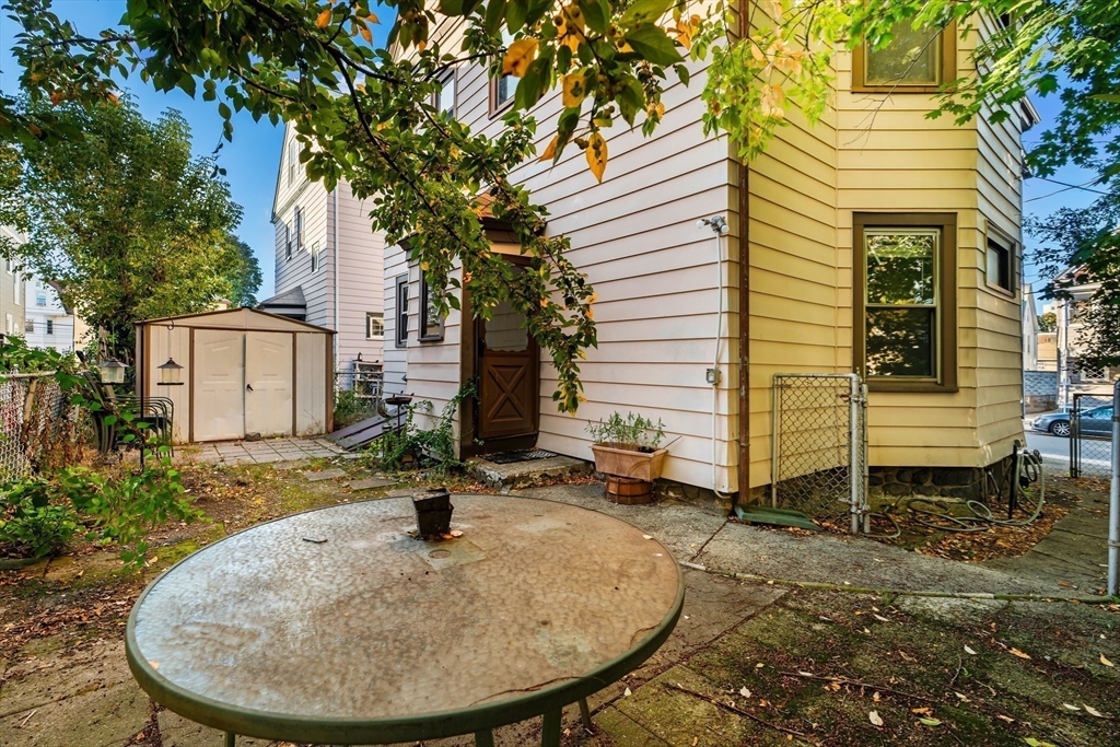 15-17 Cushman Road Boston, MA 02135 - Photo 26 of 27 a backyard of a house