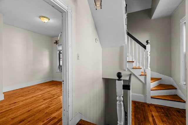 a view of entryway with wooden floor