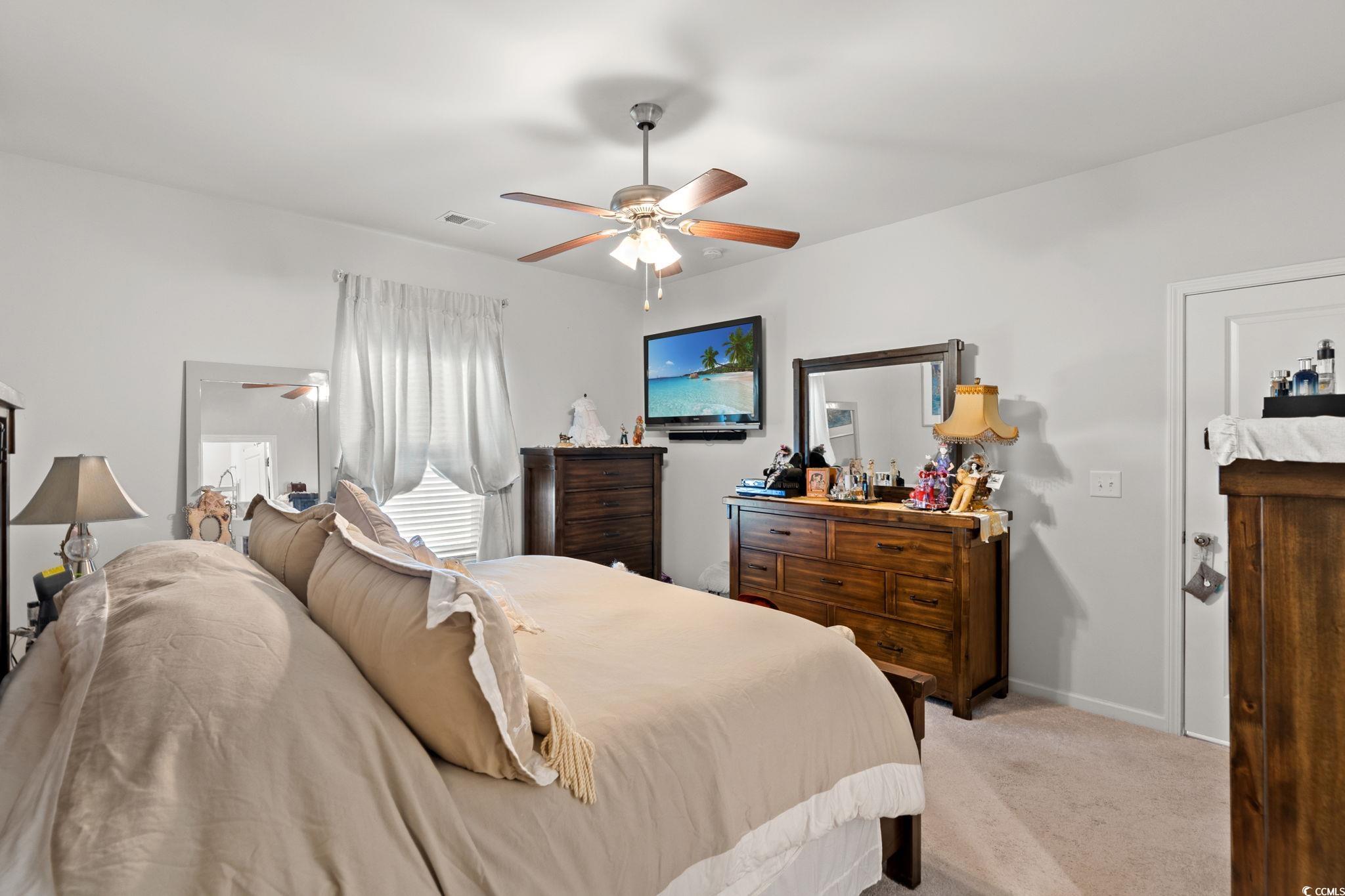 155 Marsh Deer Place Surfside Beach, SC 29575 - Photo 12 of 35 Bedroom with a ceiling fan, baseboards, carpet, and visible vents