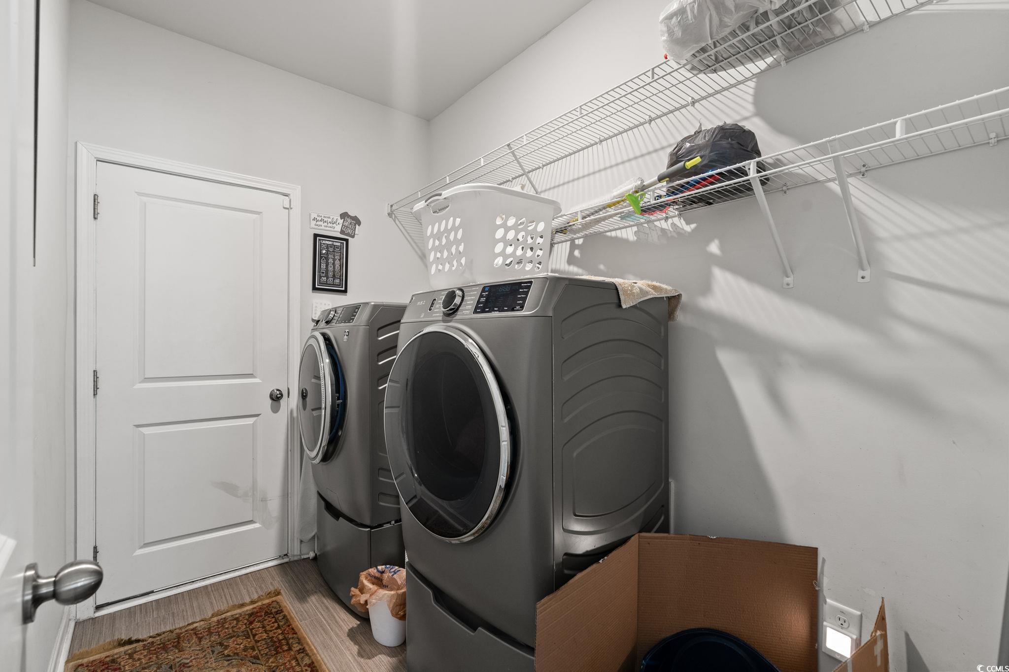 155 Marsh Deer Place Surfside Beach, SC 29575 - Photo 20 of 35 Washroom with wood finished floors, washer and dryer, and laundry area
