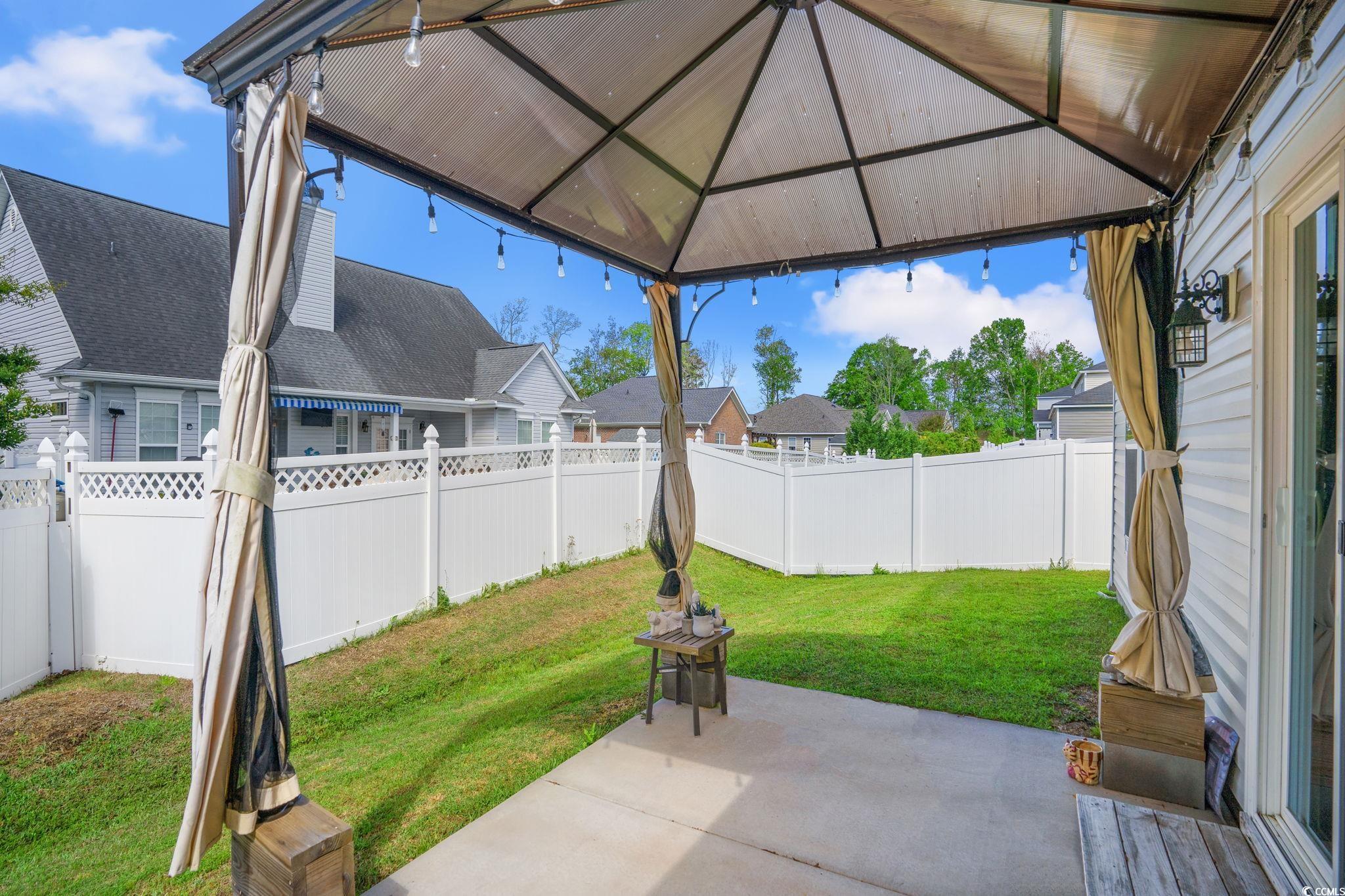 155 Marsh Deer Place Surfside Beach, SC 29575 - Photo 21 of 35 View of patio featuring a gazebo and a fenced backyard
