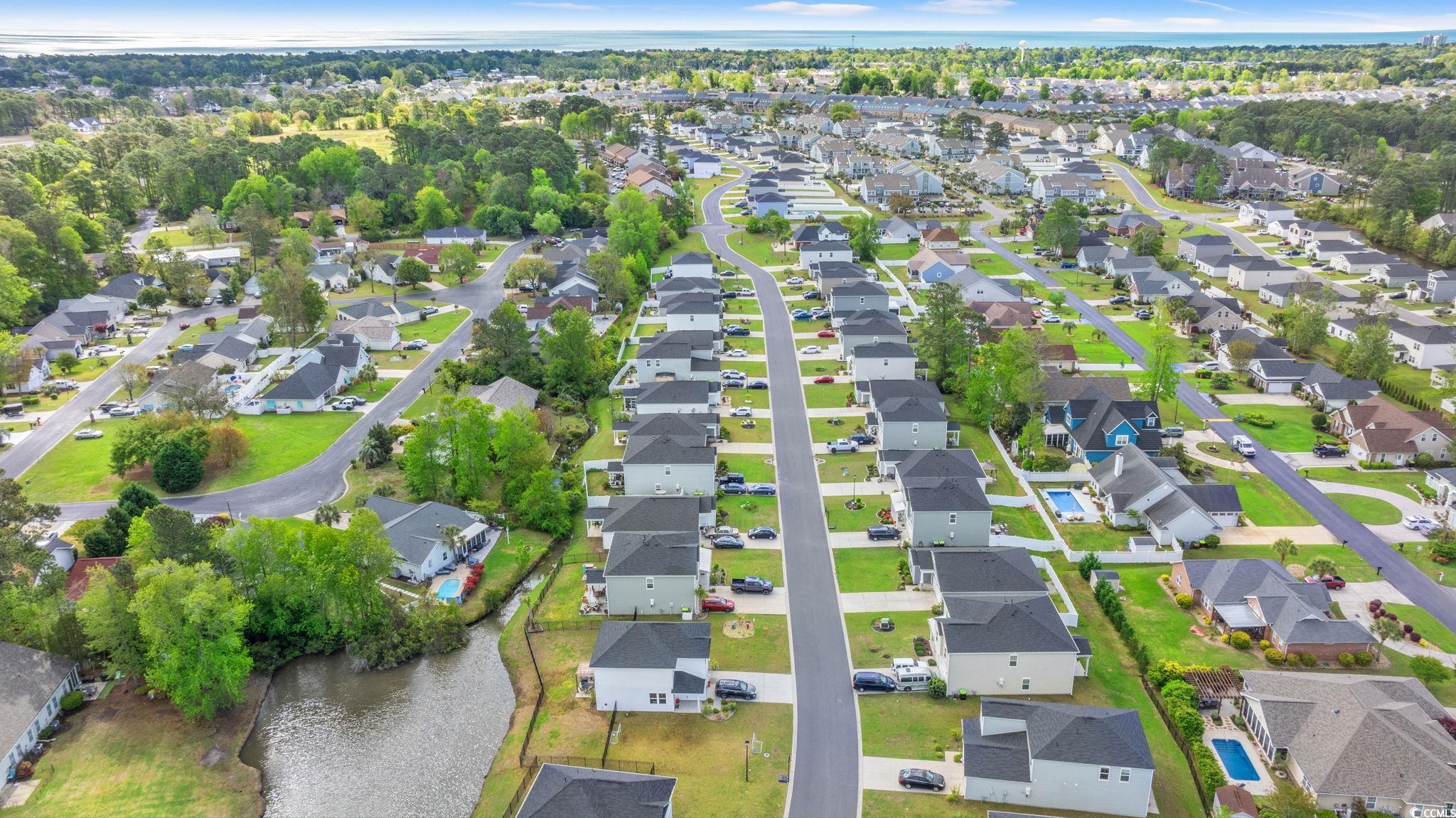 155 Marsh Deer Place Surfside Beach, SC 29575 - Photo 30 of 35 Drone / aerial view featuring a residential view and a water view