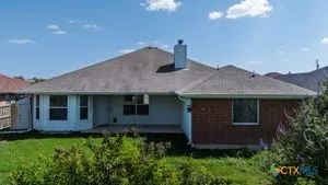 a house view with a garden space