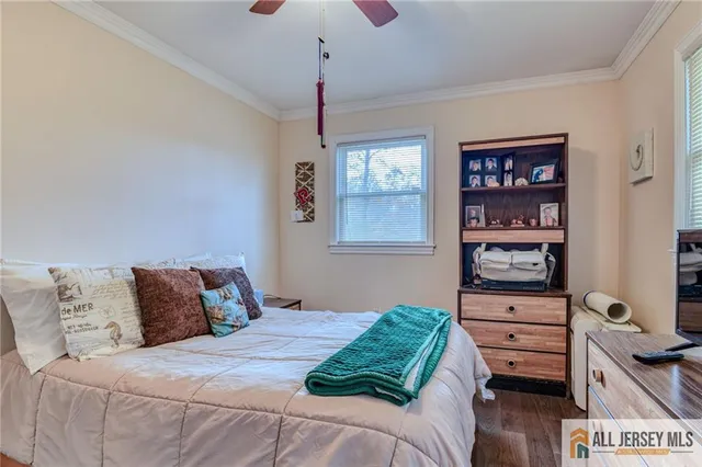 a bedroom with a bed and furniture