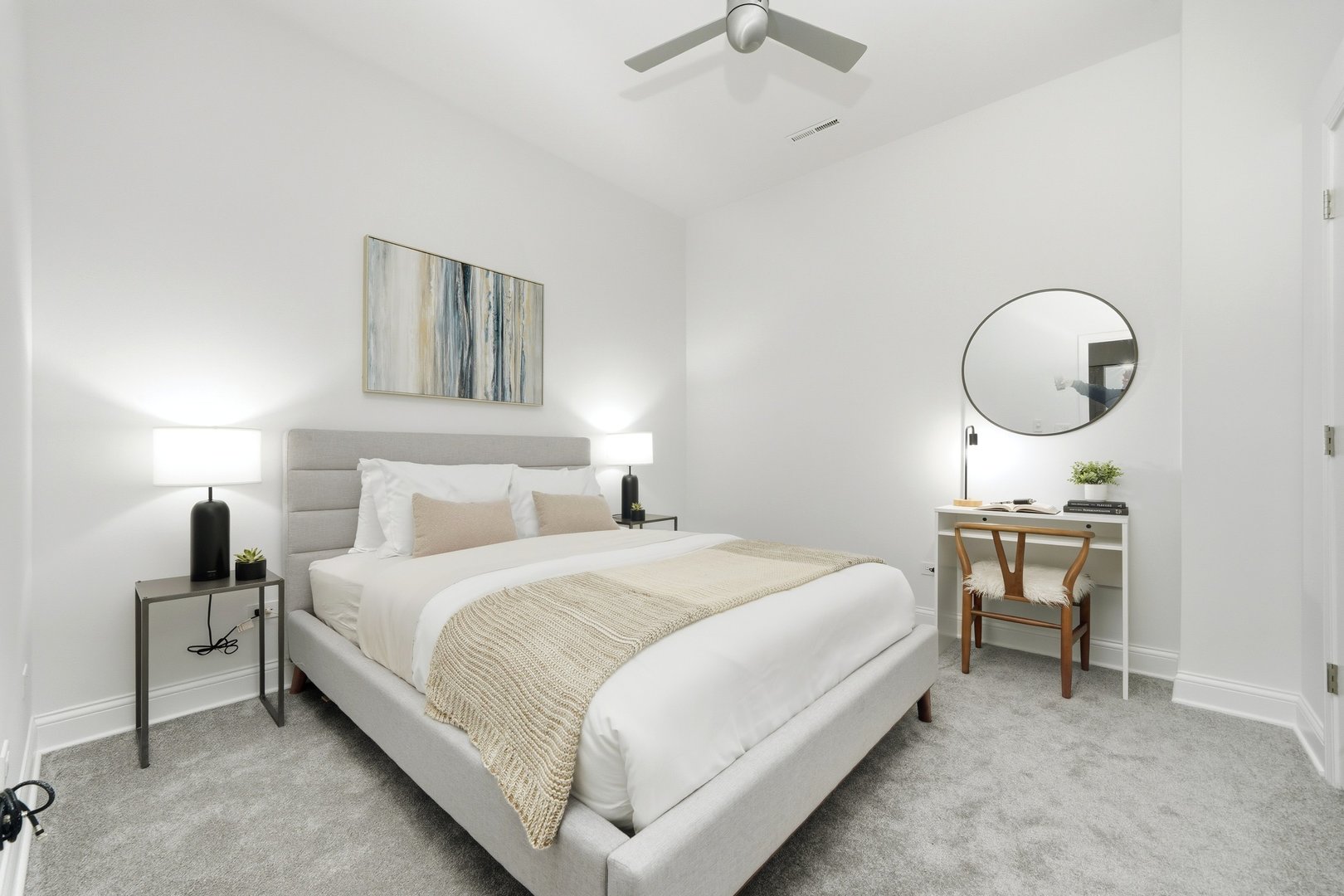 800 West Cornelia Avenue, Unit 307 Chicago, IL 60657 - Photo 19 of 22 a bedroom with bed and a chandelier