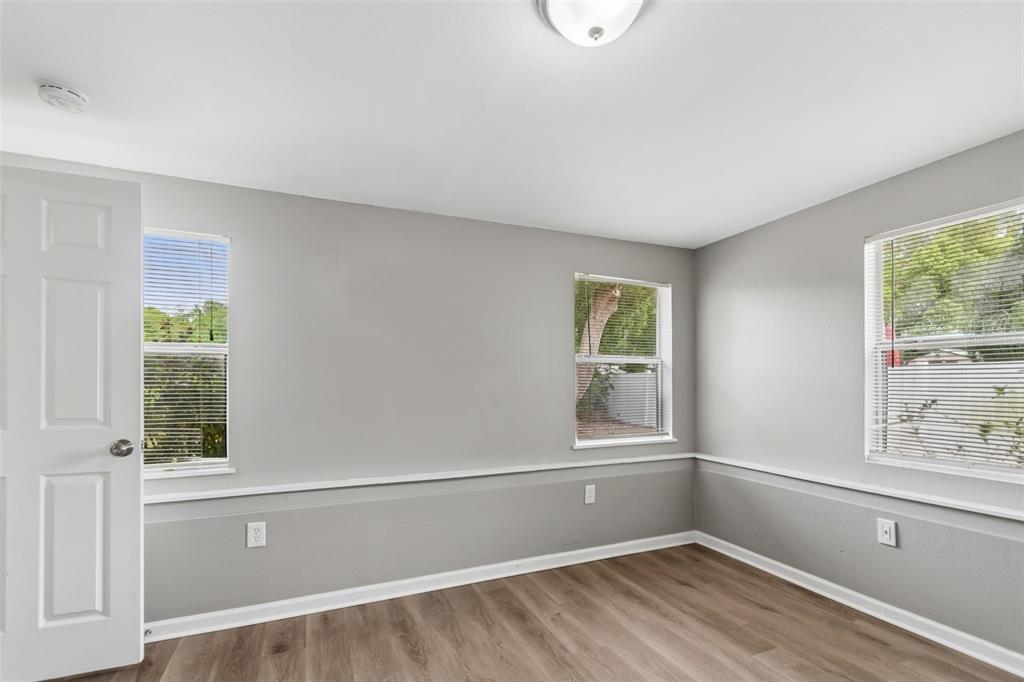 9931 110th Street Seminole, FL 33772 - Photo 26 of 52 a view of room with window and hardwood floor