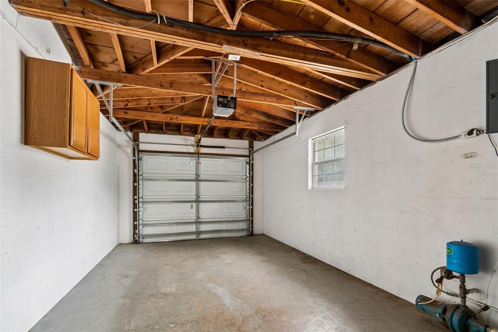 9931 110th Street Seminole, FL 33772 - Photo 41 of 52 a view of a room with racks on the wall