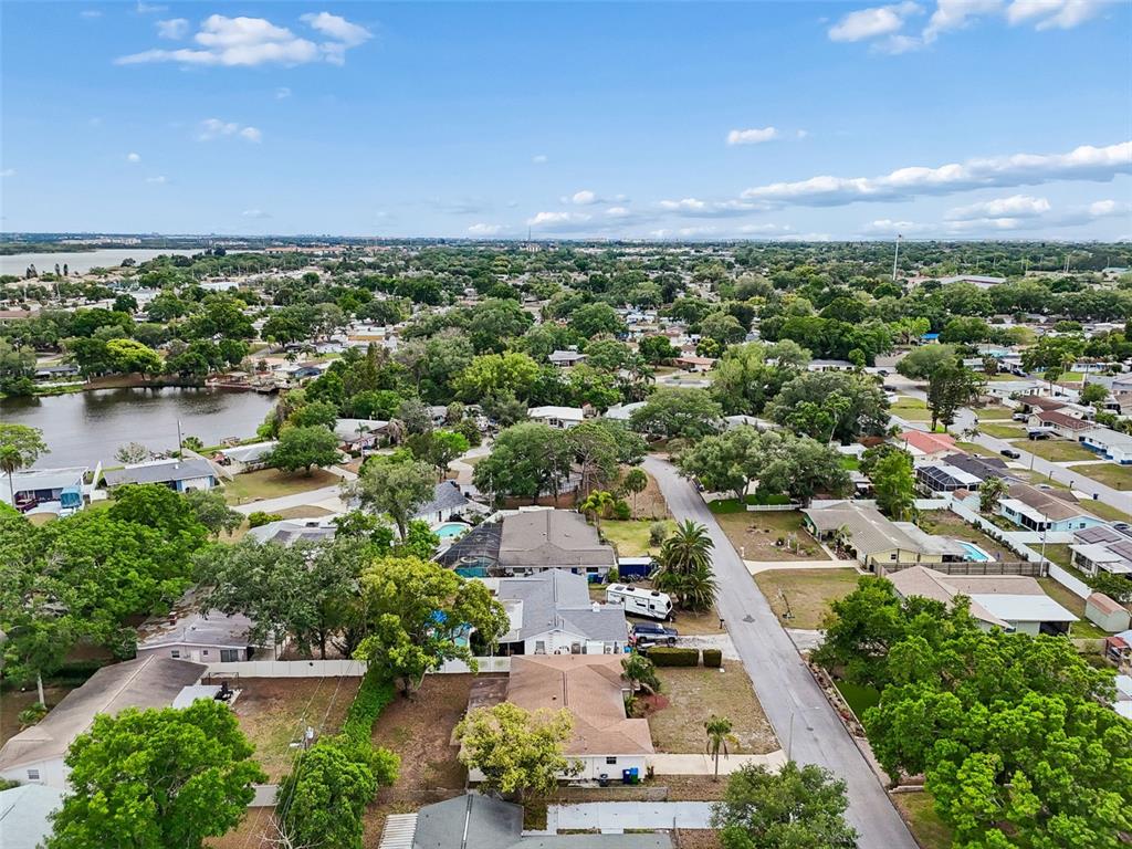 9931 110th Street Seminole, FL 33772 - Photo 51 of 52 an aerial view of a city with lots of residential buildings lake and ocean view