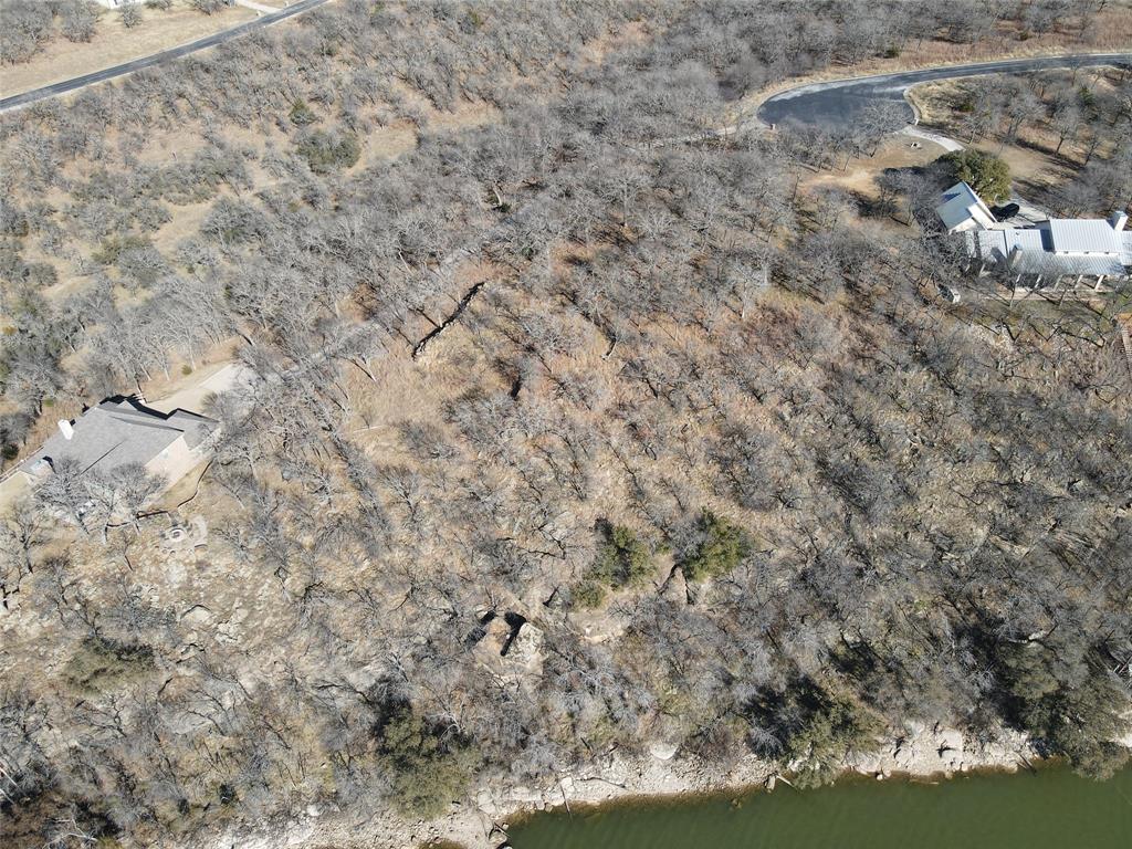 Tbd Ridgeline Drive Chico, TX 76431 - Photo 4 of 7 a view of a dry yard with trees
