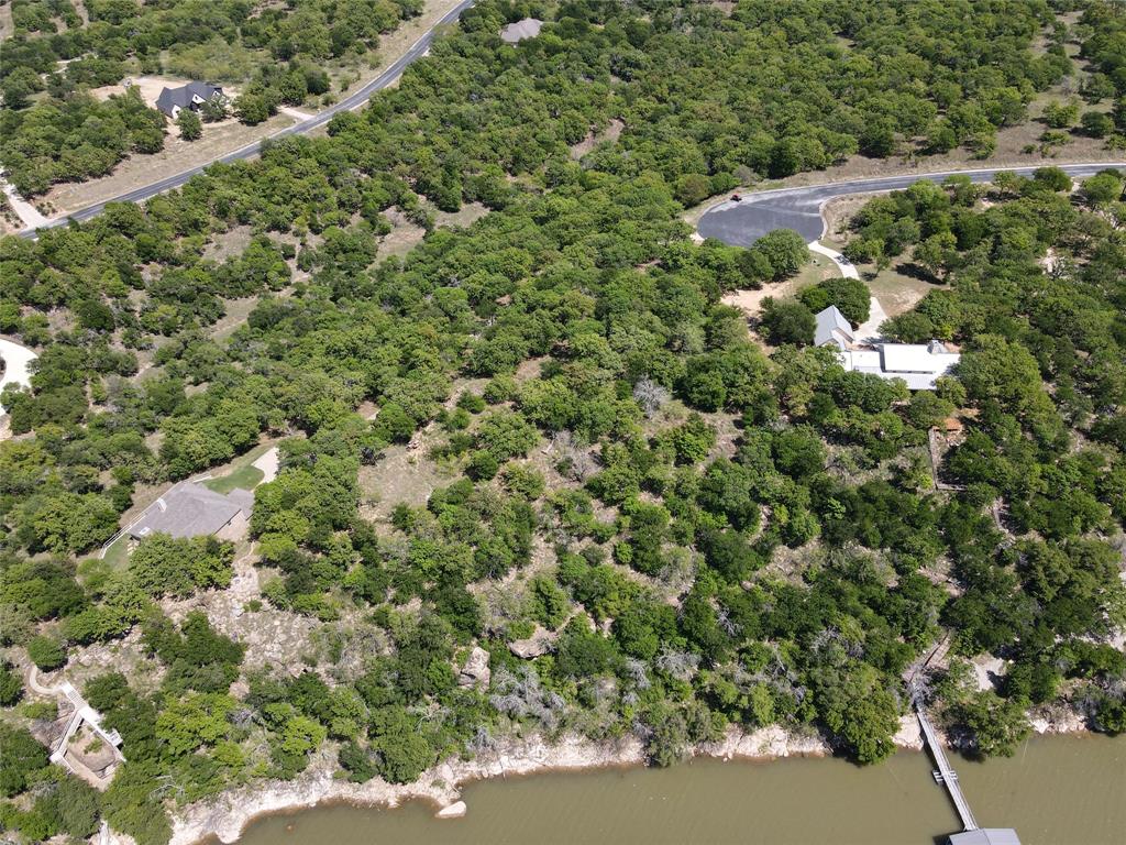 Tbd Ridgeline Drive Chico, TX 76431 - Photo 10 of 14 a view of a house with a yard