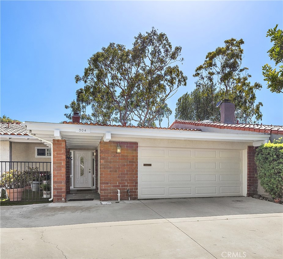 front view of a house with a garage