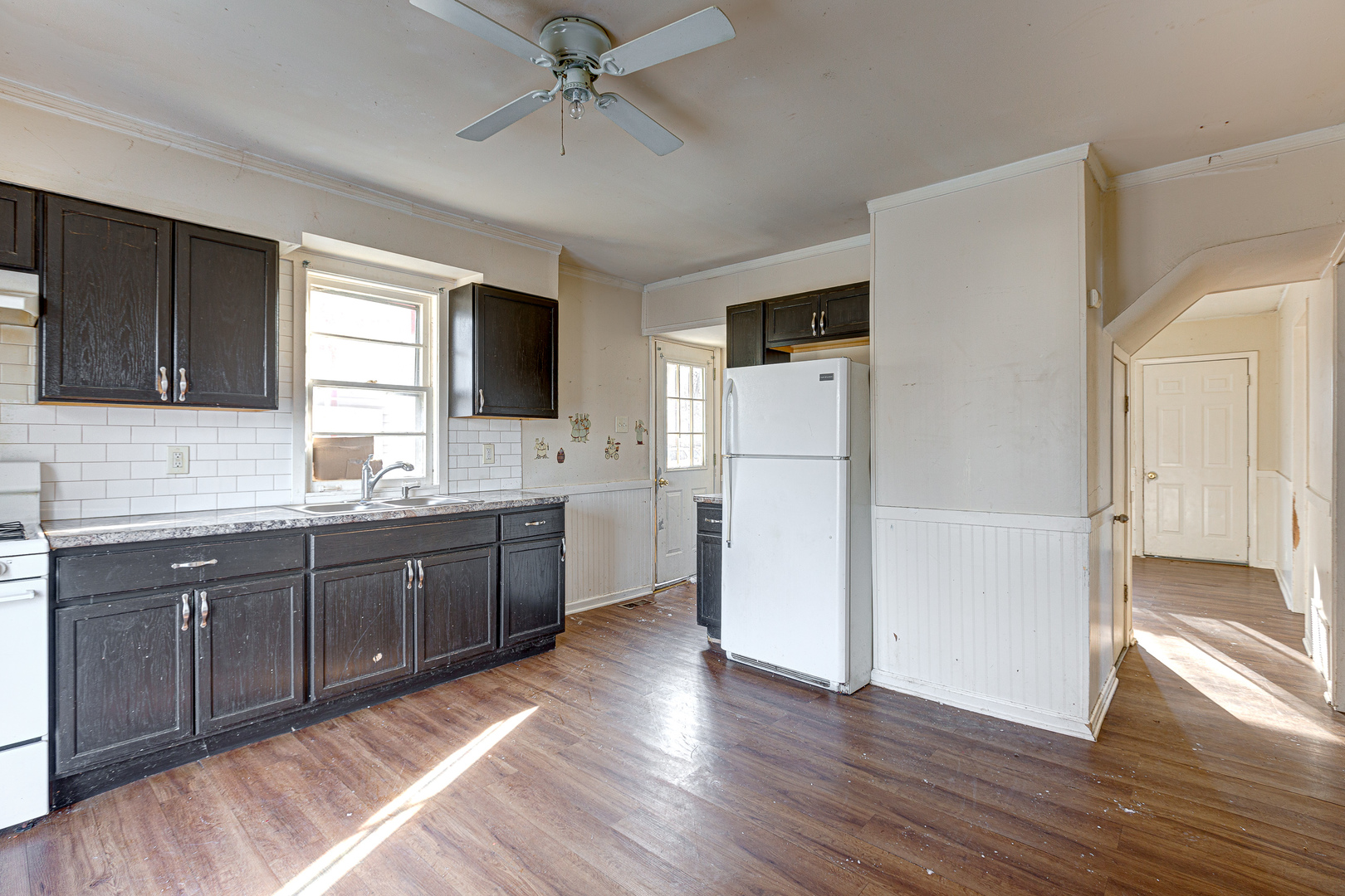 326 West Park Road Round Lake, IL 60073 - Photo 5 of 22 a large kitchen with a refrigerator and a stove top oven