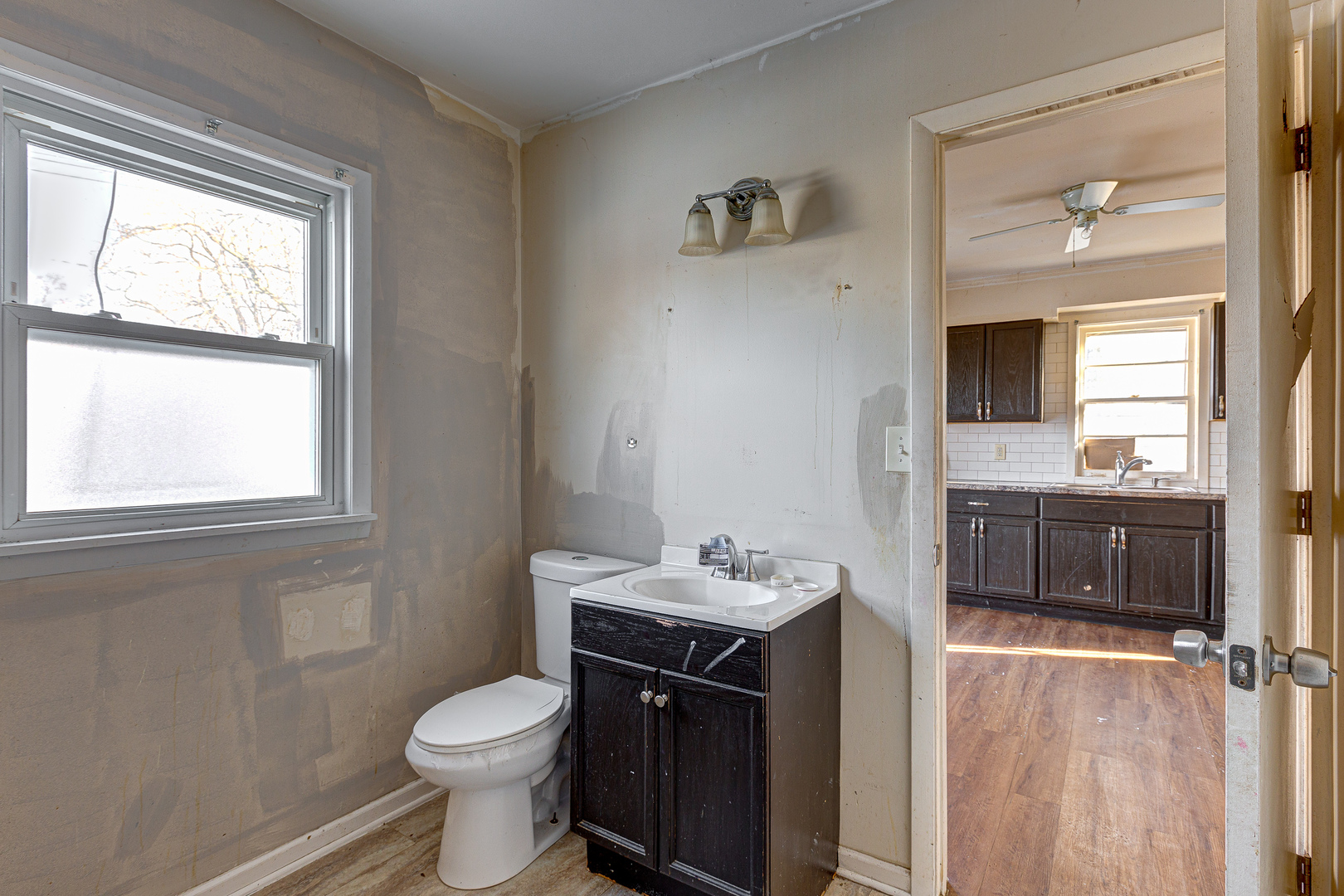 326 West Park Road Round Lake, IL 60073 - Photo 6 of 22 a bathroom with a sink toilet and vanity