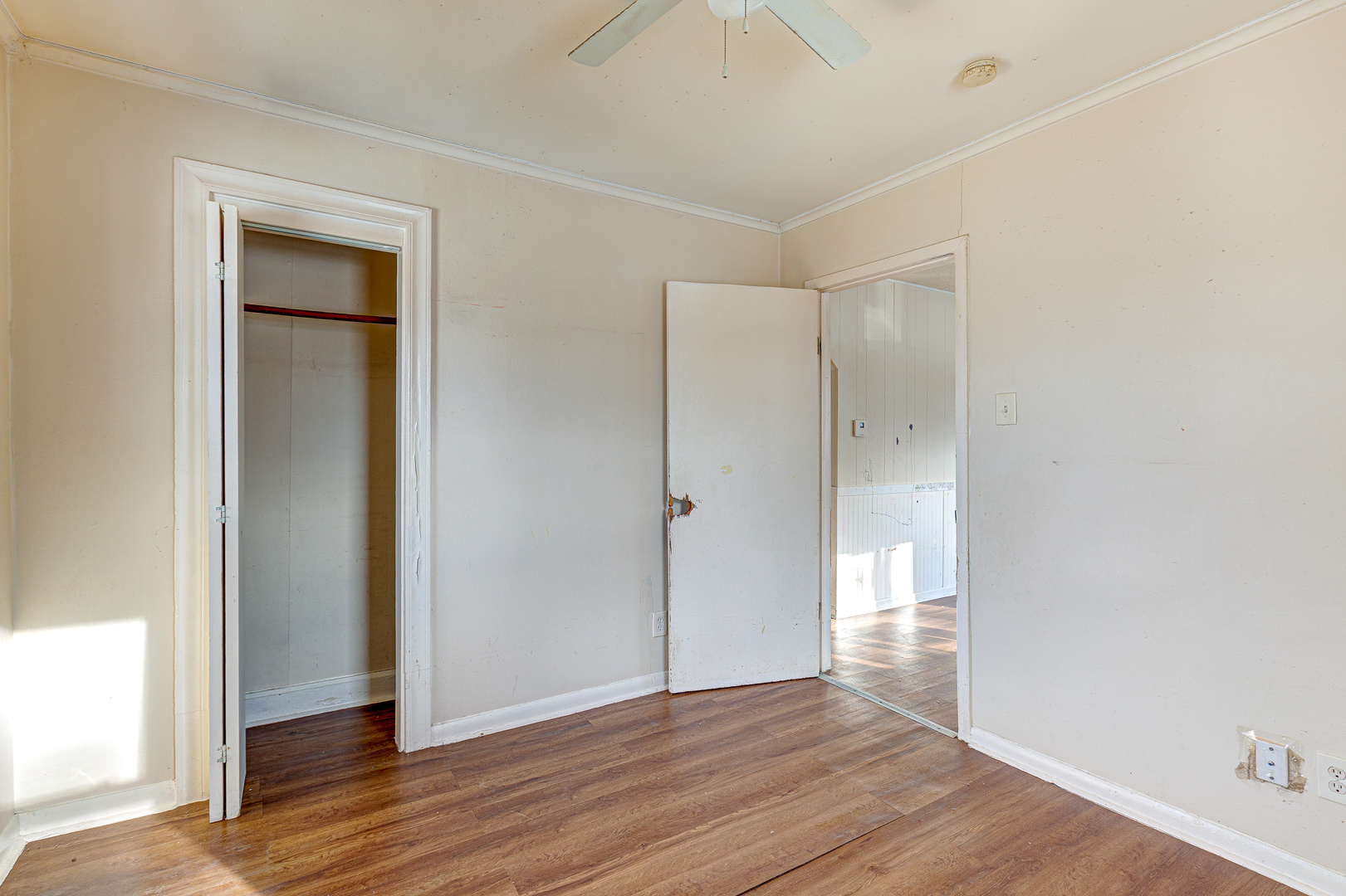326 West Park Road Round Lake, IL 60073 - Photo 9 of 22 a view of an empty room with wooden floor and closet