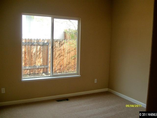 13577 Gold Run Drive Reno, NV 89521 - Photo 10 of 13 an empty room with a window