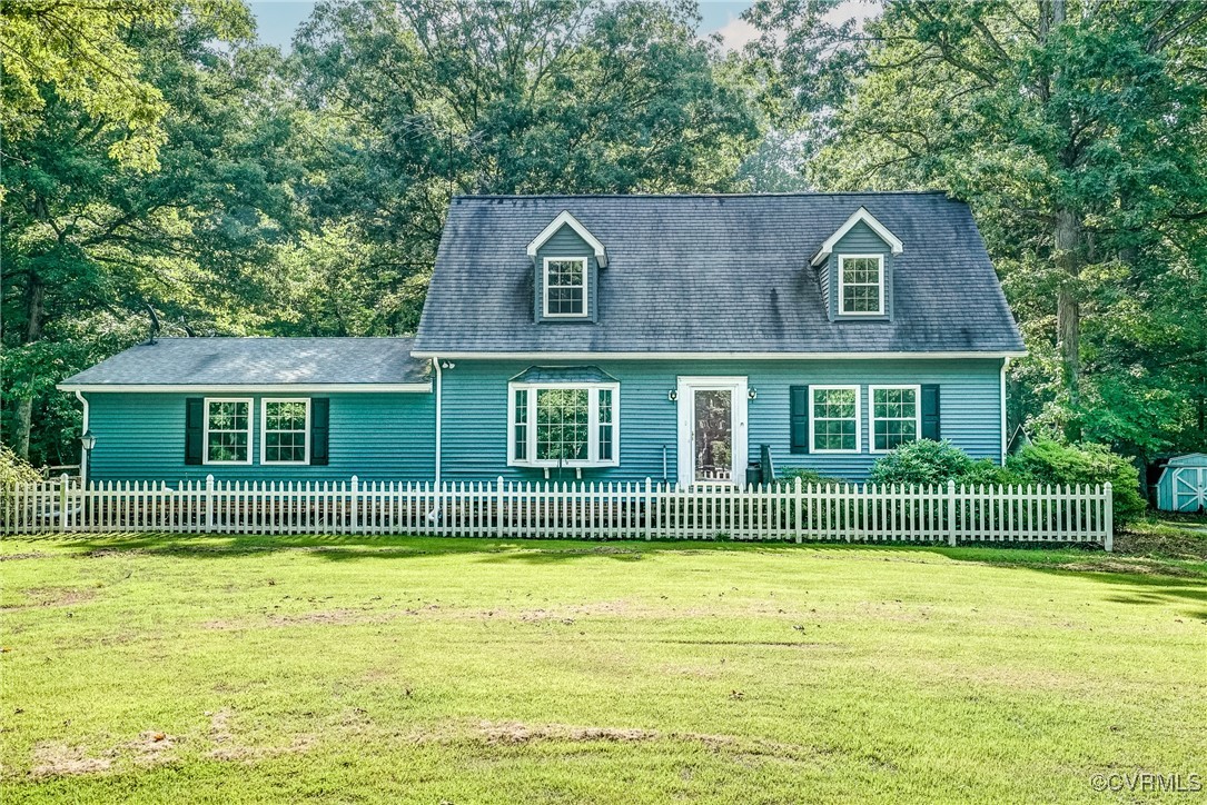 13800 Cross County Road Mineral, VA 23117 - Photo 1 of 47 a front view of a house with a garden