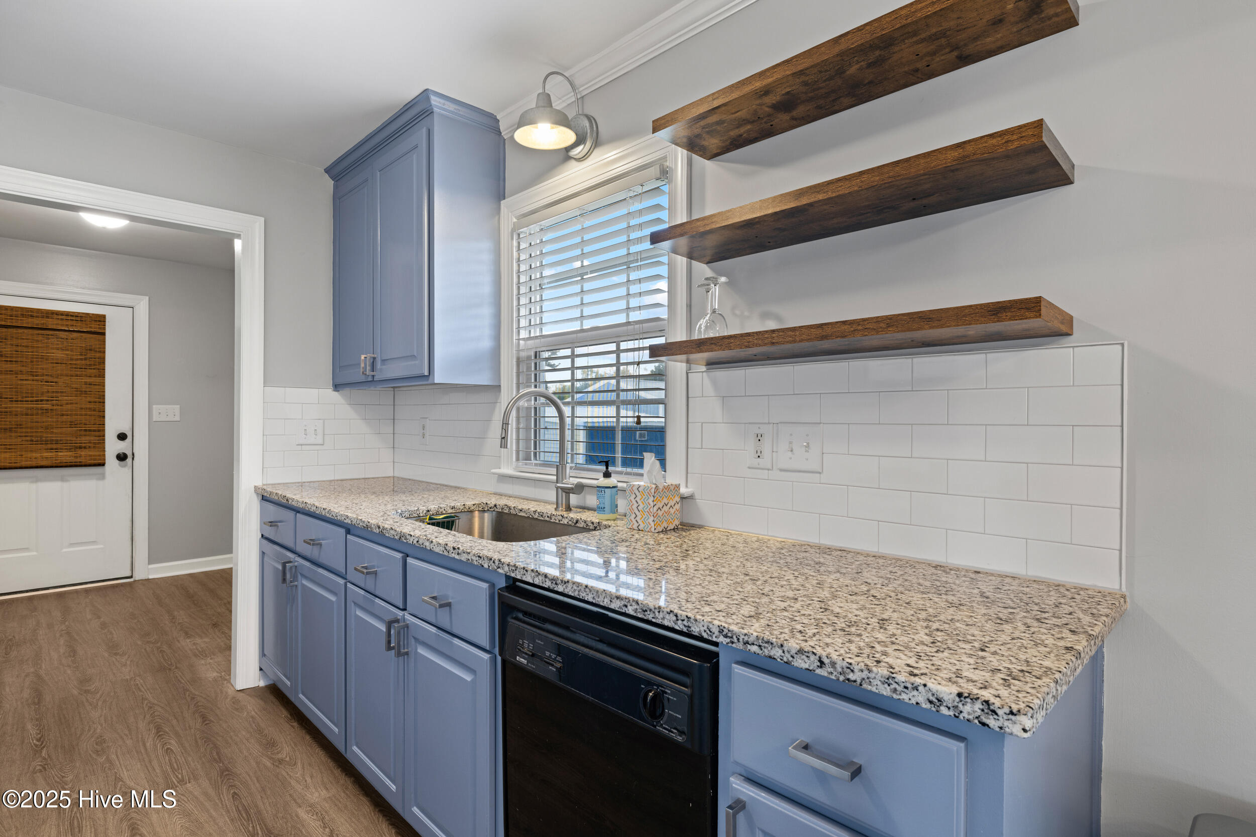 105 Olive Lane Mount Olive, NC 28365 - Photo 9 of 31 Granite Countertops and Floating shelves