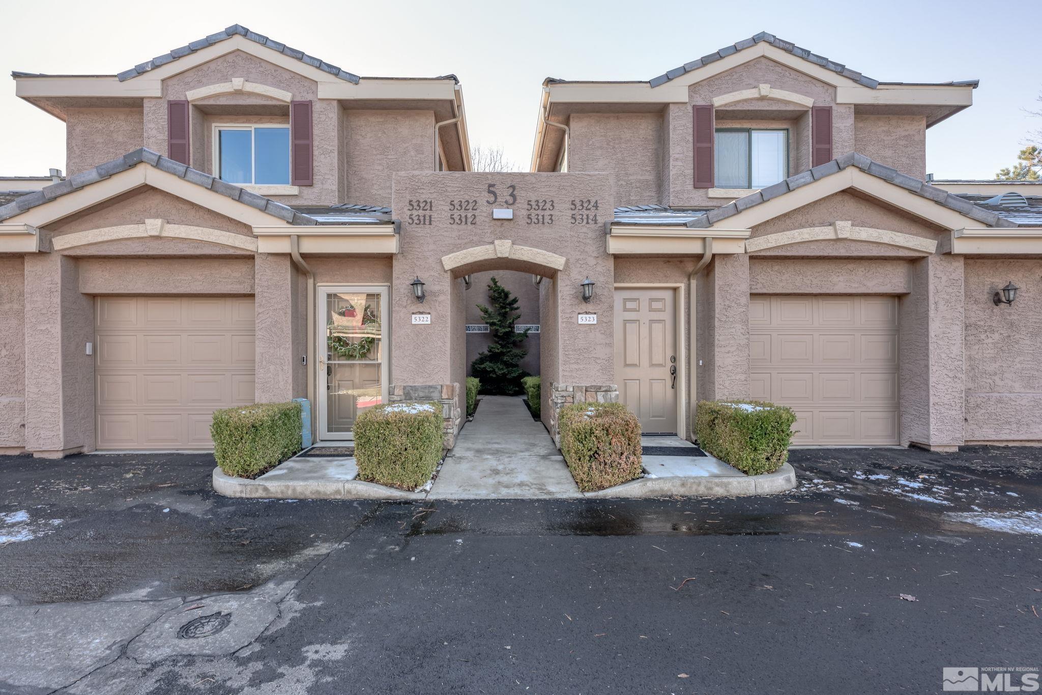 900 S Meadows, Unit 5313 Reno, NV 89521 - Photo 1 of 29 a front view of a house with garden