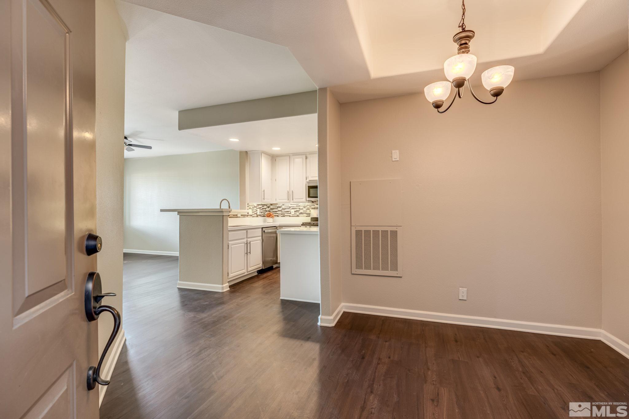 900 S Meadows, Unit 5313 Reno, NV 89521 - Photo 4 of 29 a view of kitchen with wooden floor