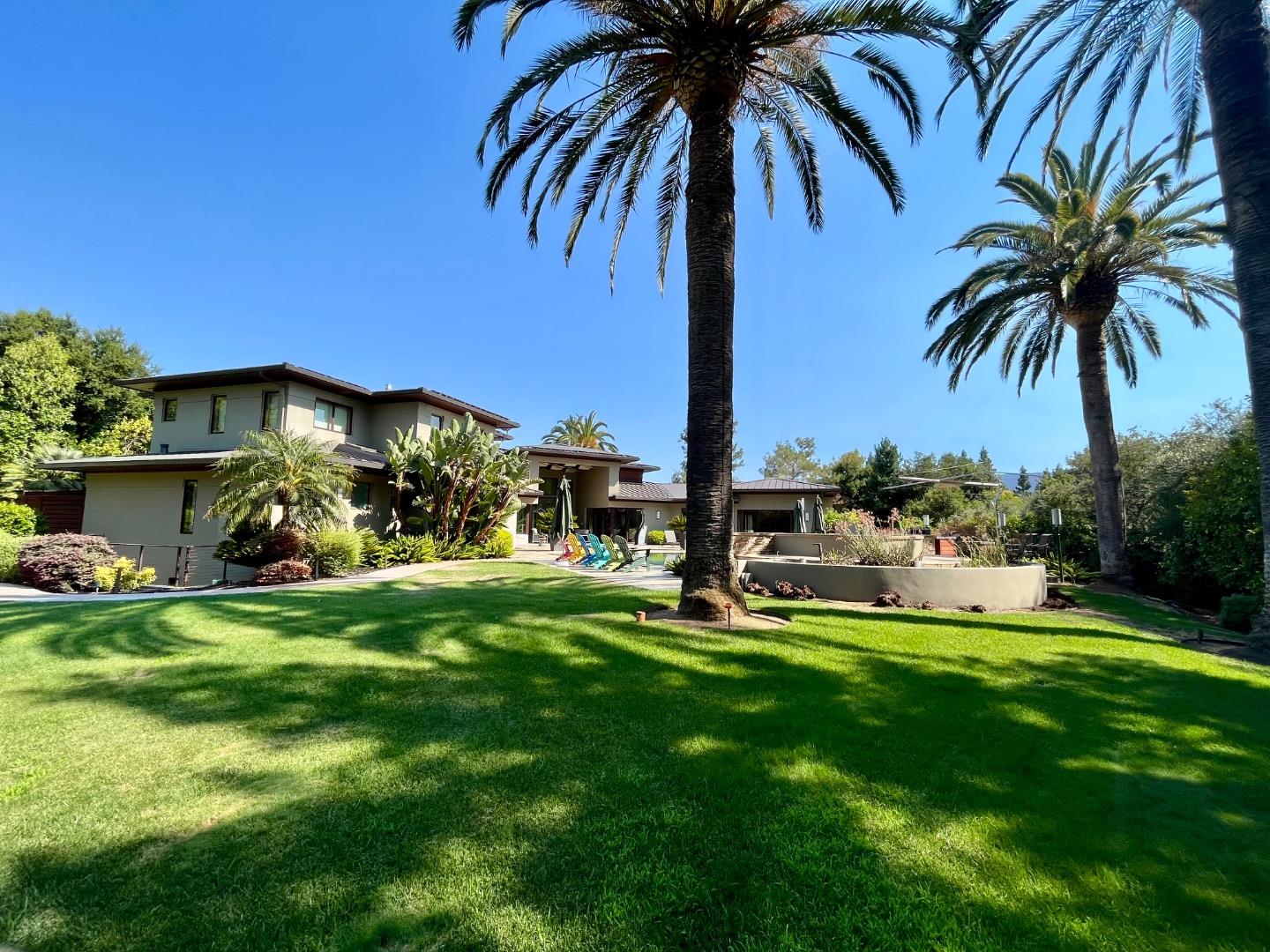 25893 Fremont Road Los Altos Hills, CA 94022 - Photo 1 of 1 a view of a backyard with a garden and plants
