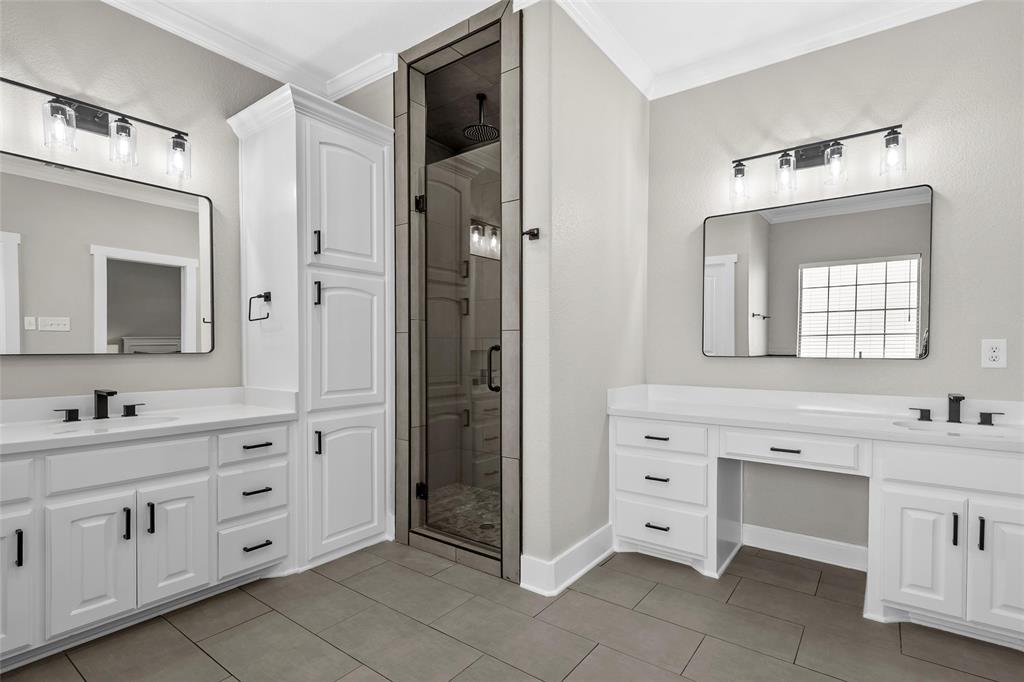 404 Casa Del Rancho Road Lorena, TX 76655 - Photo 14 of 36 a bathroom with a double vanity sink mirror and