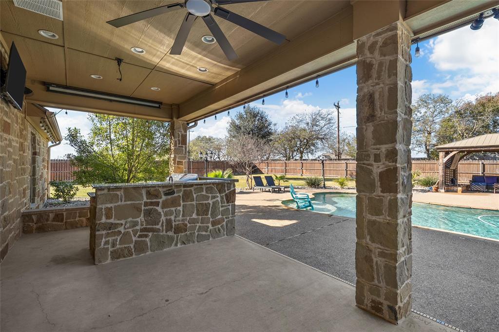404 Casa Del Rancho Road Lorena, TX 76655 - Photo 20 of 36 a view of a porch with furniture and a yard