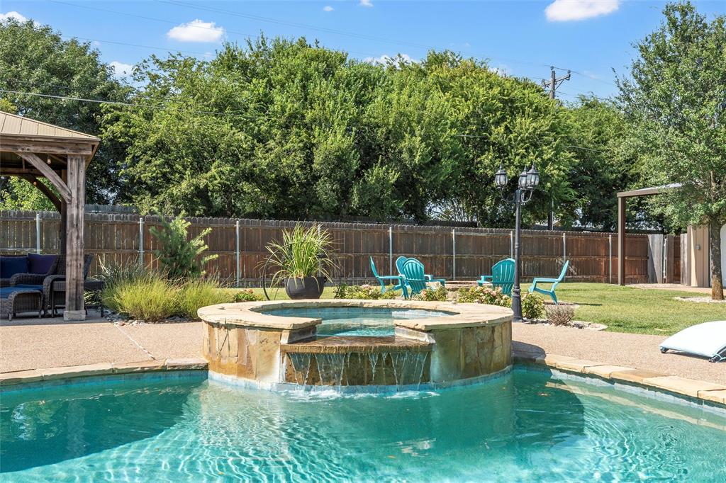 404 Casa Del Rancho Road Lorena, TX 76655 - Photo 26 of 36 a view of a house with a yard and sitting area