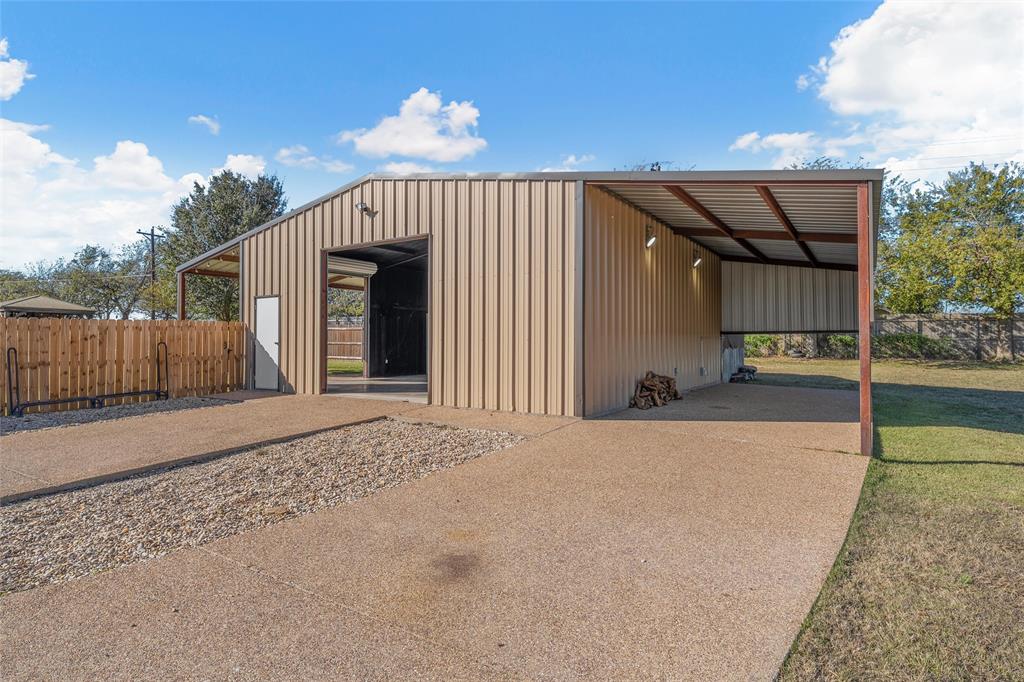 404 Casa Del Rancho Road Lorena, TX 76655 - Photo 31 of 36 a view of a house with a patio