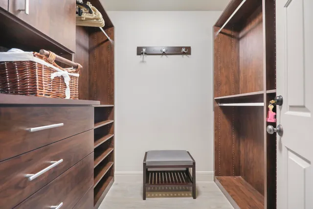 a bathroom with a sink a mirror and a shower