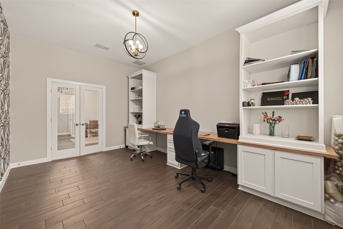 2706 Ripe Amber Cup Court Richmond, TX 77406 - Photo 22 of 50 a view of a workspace with furniture and a window