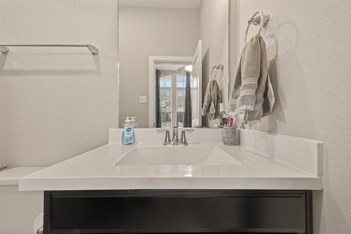 2706 Ripe Amber Cup Court Richmond, TX 77406 - Photo 23 of 50 a bathroom with a sink and a mirror