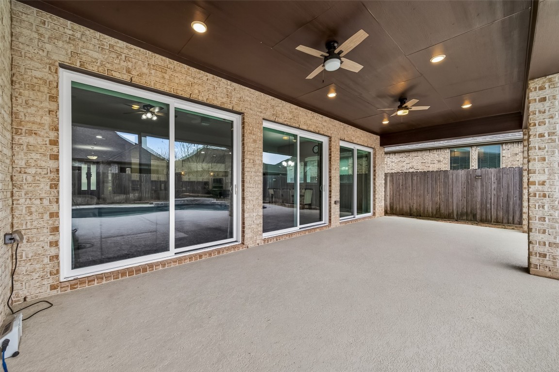 2706 Ripe Amber Cup Court Richmond, TX 77406 - Photo 47 of 50 a view of an empty room with a ceiling fan and window